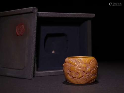 A Chinese Tianhuang Stone Thumb Ring With Dragon Carving