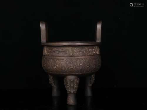 A Chinese Bronze Tripod Censer With Beast Carving