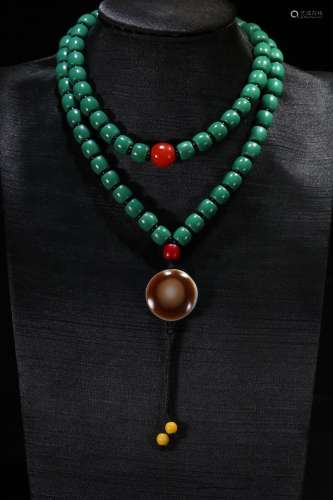 A Chinese Sherpa Glass Bead Necklace With Dzi