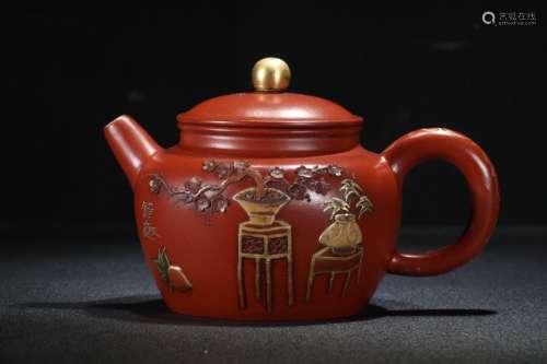 A Chinese Zisha Teapot Of Golden Painting With Mark