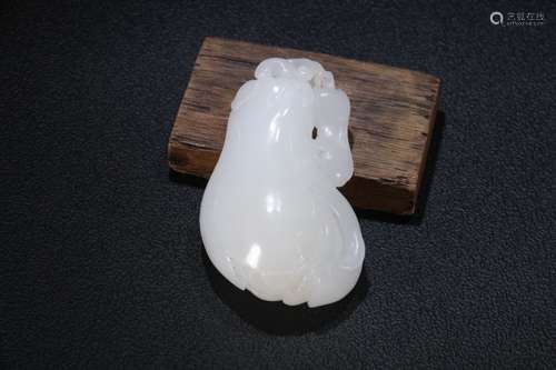 A Chinese Hetian Jade Pendant With Carving