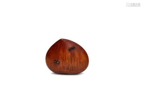 Tadakuni (active 19th century) A wood netsuke of chestnuts Edo period (1615-1868), 19th century