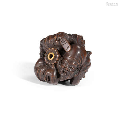 Ryuzan (active 19th/20th century) A wood manju-style netsuke Edp period (1615-1868) or Meiji era (1868-1912), 19th/20th century