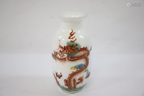 An enamel on Peking glass vase