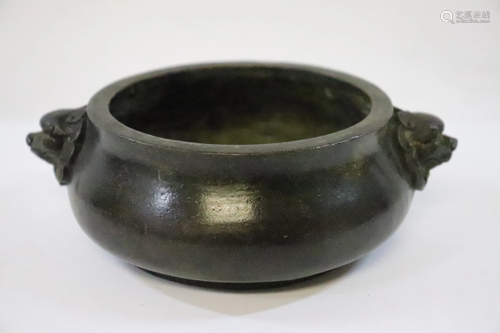 A heavy bronze open censer