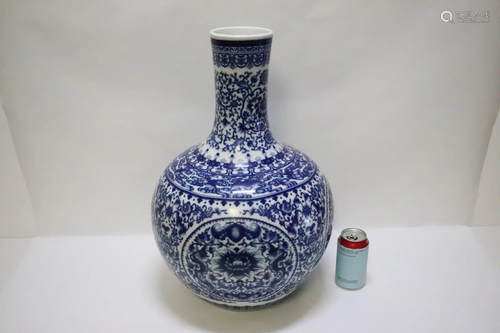 A large Chinese vintage blue and white bottle vase