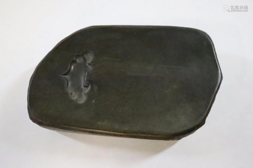 A stone inkwell