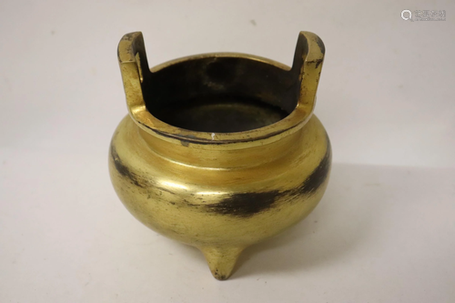 A heavy gilt bronze censer