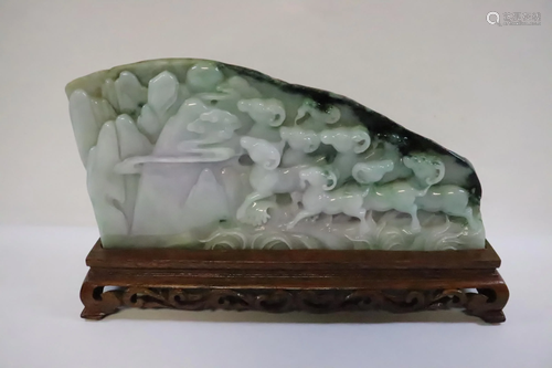 A natural color lavender jadeite carved boul…