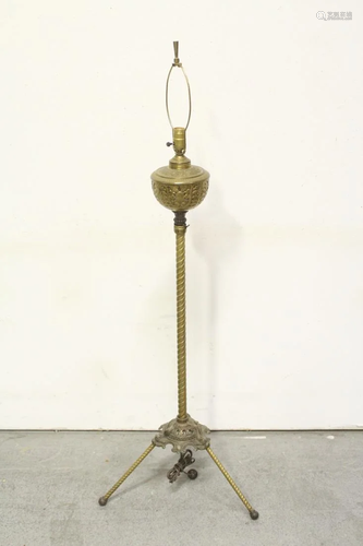 A fancy Victorian brass floor lamp