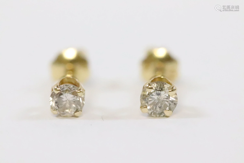 Pair 14K Y/G diamond stud earrings