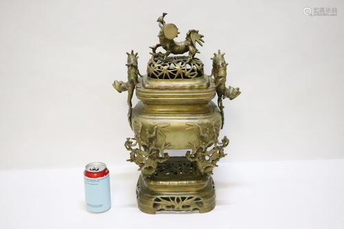 A massive Chinese bronze covered censer