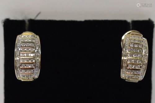 Pair 10K Y/G diamond earrings