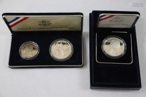 2 silver dollars and one silver half dollar set