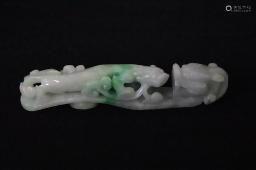 A beautiful apple green jadeite carved belt buckle