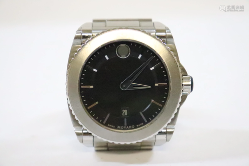 Movado large face wrist watch with titanium be…