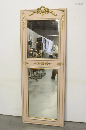 A fancy painted French door with mirror