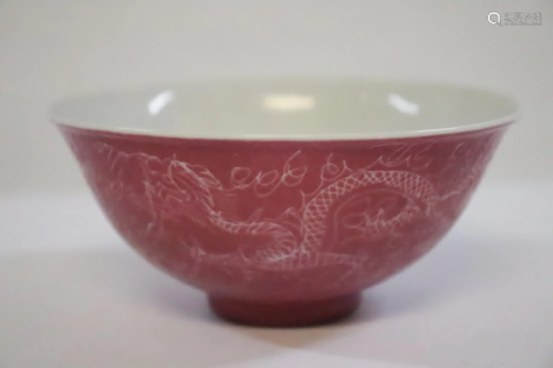 A pink glazed porcelain bowl