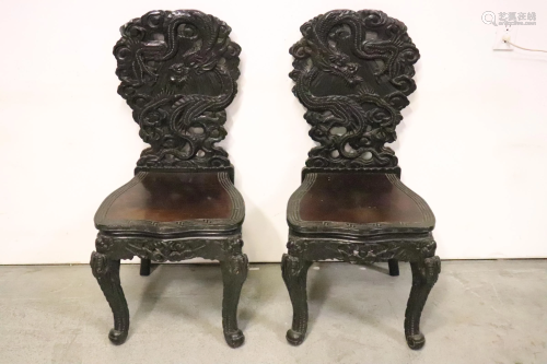 Pair Chinese heavily carved chairs