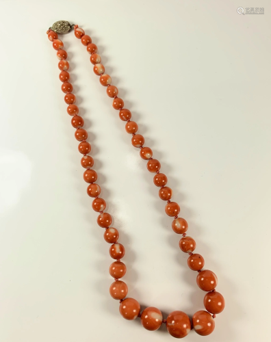 A Silver Coral Bead Necklace