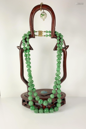 A 14k Gold Jadeite Bead Necklace