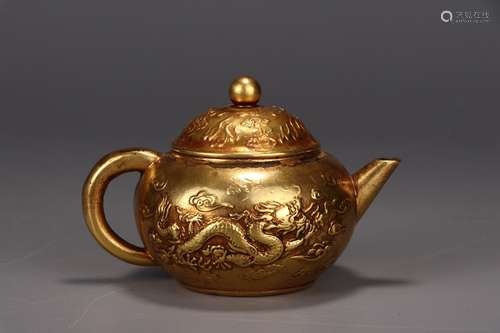 A Chinese Gilt Bronze Pot With Dragon Carving