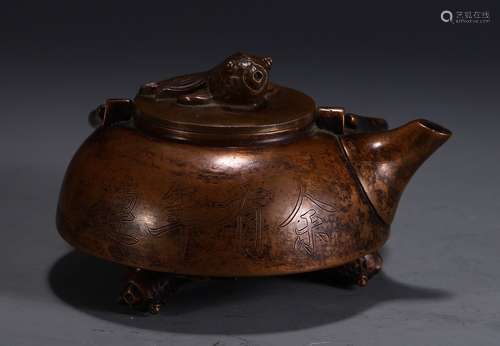 A Chinese Bronze Pot With Handle