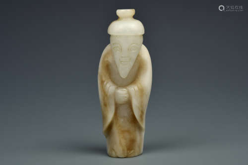 A WHITE AND RUSSET JADE FIGURE QING DYNASTY