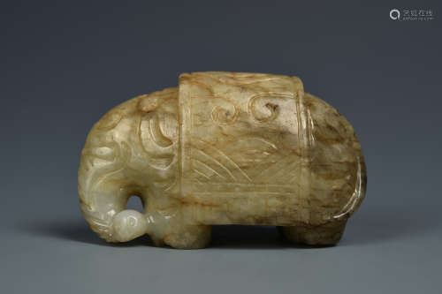 A CREAMY WHITE AND RUSSET JADE ELEPHANT MING DYNASTY