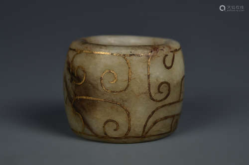 A GOLD INLAID WHITE JADE RING HAN DYNASTY