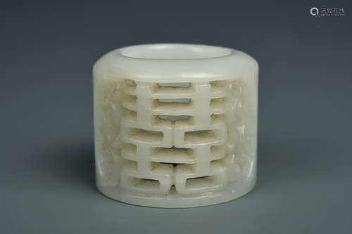 A RETICULATED WHITE JADE ARCHERS RING QING DYNASTY