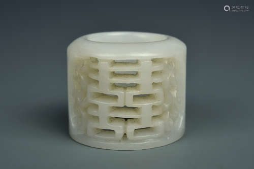 A RETICULATED WHITE JADE ARCHERS RING QING DYNASTY