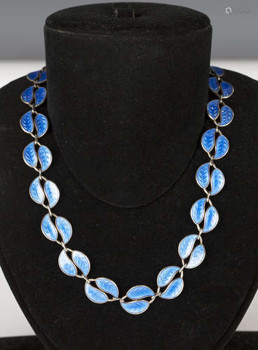 A Norwegian silver and pale blue enamelled necklace by David Andersen, the links in a twin leaf