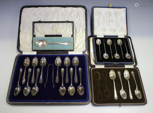 A set of twelve George V silver teaspoons and matching sugar tongs, Sheffield 1918 by Cooper