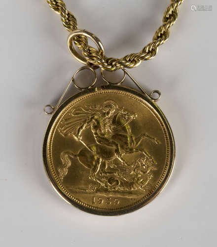 An Elizabeth II sovereign 1959, in a 9ct gold pendant mount with a gilt metal neckchain, detailed '
