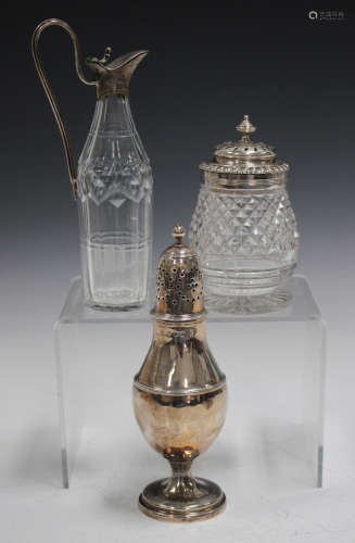 A George III silver caster of baluster form with pierced dome cover, London 1798, height 16cm,