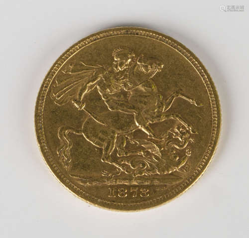 A Victorian Young Head sovereign 1873S with St George and the Dragon reverse.Buyer’s Premium 29.