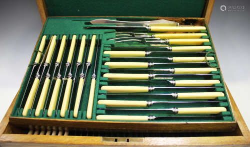 An Edwardian canteen of plated Old English pattern cutlery by Alexander Clark Co Ltd, comprising