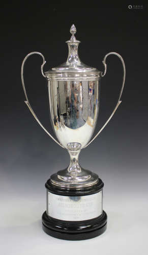 A George V silver two-handled trophy cup and cover, the U-shaped body inscribed 'Swaffham Coursing