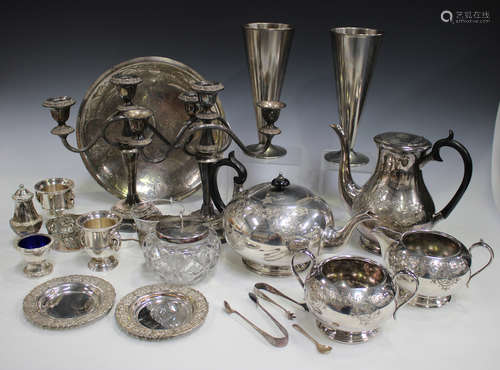 A group of assorted plated items, including a four-piece tea set and a silver handled knife.Buyer’