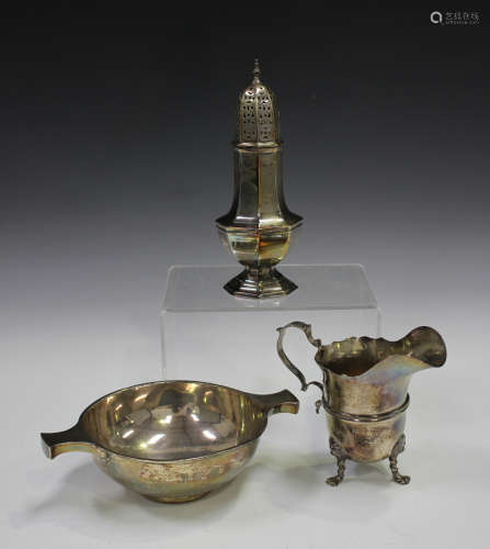 An Edwardian silver sugar caster of octagonal baluster form, London 1904 by William Hutton & Sons,
