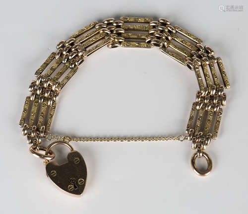 A gold decorated bar and plain oval link gate bracelet, length 18.5cm, with a gold plain heart