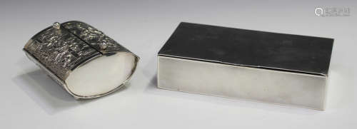 A silver rectangular cigarette box with hinged lid and engine turned decoration, Birmingham 1936,