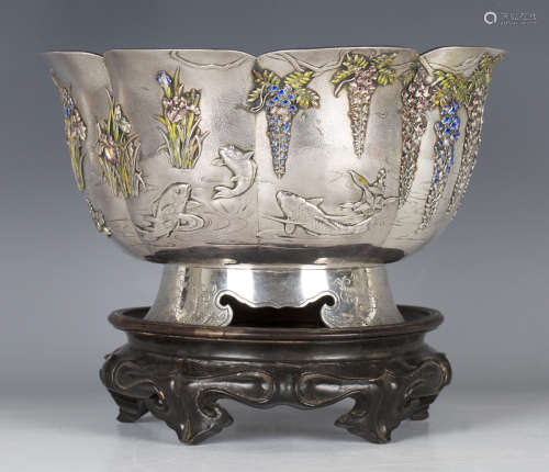 A Japanese silver and enamel lobed bowl, Meiji period, circa 1900, the stippled exterior finely
