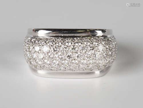 A French white gold and diamond wide band ring, the centre raised with a diamond set bombé