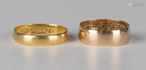 A Victorian 22ct gold plain wedding ring, London 1882, ring size approx O1/2, and a 9ct gold wedding