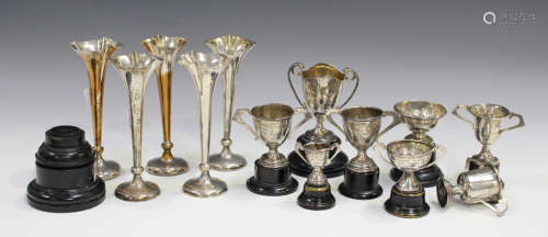 A set of five Edwardian silver spill vases, each with pinched and beaded trefoil rim, Birmingham