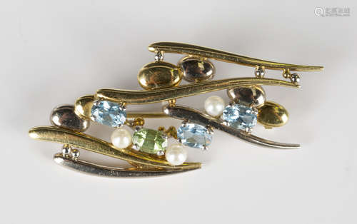 An 18ct two colour gold, aquamarine, peridot and cultured pearl brooch in an abstract design,