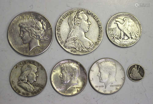 A collection of foreign coins, including a USA one dollar 1934, four half-dollars, comprising