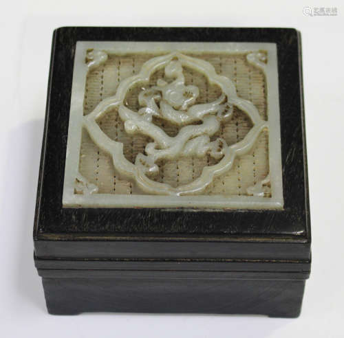 A Chinese pale celadon jade and hardwood box and cover, 20th century, of square form, the cover